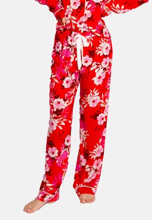 Bloemenpyjamabroek in levendig rood, met roze en witte bloemen, losse pasvorm, elastische tailleband met trekkoord en een zachte stofstructuur.