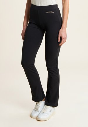 SLIM FIT - Pantaloni - nero