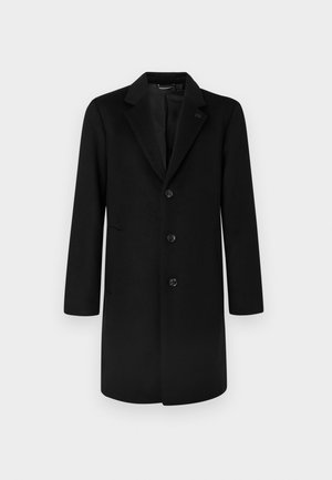 Casaco de lã preto com lapela recortada, design de botão único, três bolsos frontais e cinco botões. Textura suave e formato ajustado.