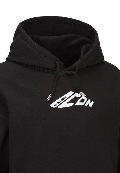 Black hoodie with a drawstring, featuring a white logo "DSQUARED2" and graphic accents. Made of soft fabric with a smooth texture.