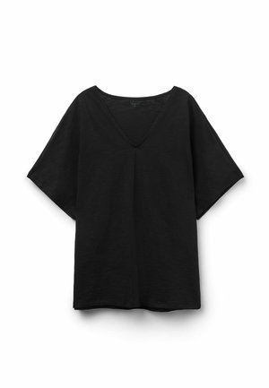Black loose-fit short-sleeve top with V-neck and textured fabric, displayed flat on a white background.