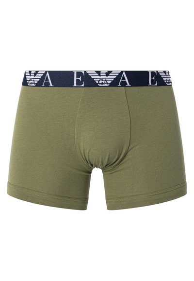 Olive green men's boxer shorts with a navy elastic waistband featuring a white logo and graphic design. Soft material and fitted shape.