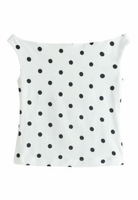 Biała bawełniana koszulka z okrągłym dekoltem i krótkimi rękawami, ozdobiona wieloma czarnymi kropkami w regularnym wzorze.