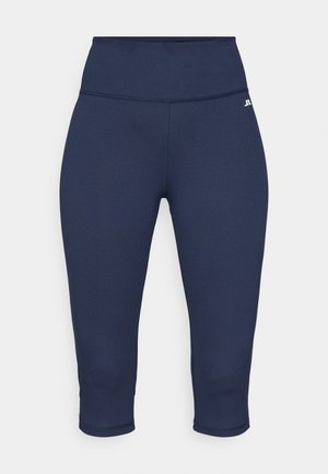 Navyblaue Capri-Leggings aus dehnbarem Stoff, mit einem hohen Bund und plattnähte. Logo auf der linken Seite nahe dem Bund.