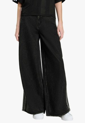 Jeans a zampa - black denim