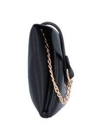 Black textured handbag with a gold chain strap, featuring a rounded shape and soft contours, showcasing a magnetic closure detail.