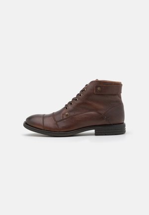 LEGADORIEN - Lace-up ankle boots - brown