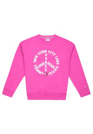 Sudadera rosa con cuello redondo, mangas largas y puños de canalé. Presenta un texto gráfico y un logo circular blanco, confeccionada con tejido suave.