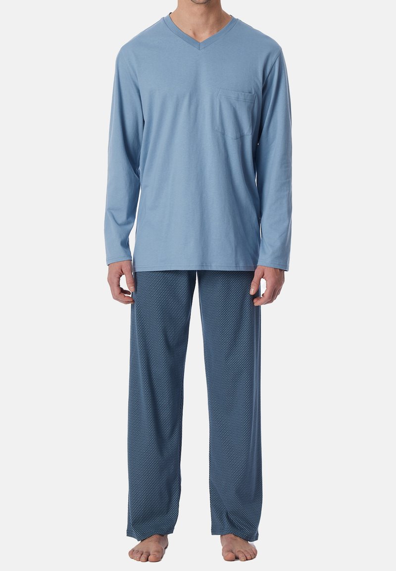 Conjunto de ropa de casa para hombres que incluye una camiseta de manga larga de color azul claro con un cuello en V y un bolsillo en el pecho, acompañada de pantalones de pijama azules con un patrón. Tejido suave y casual.