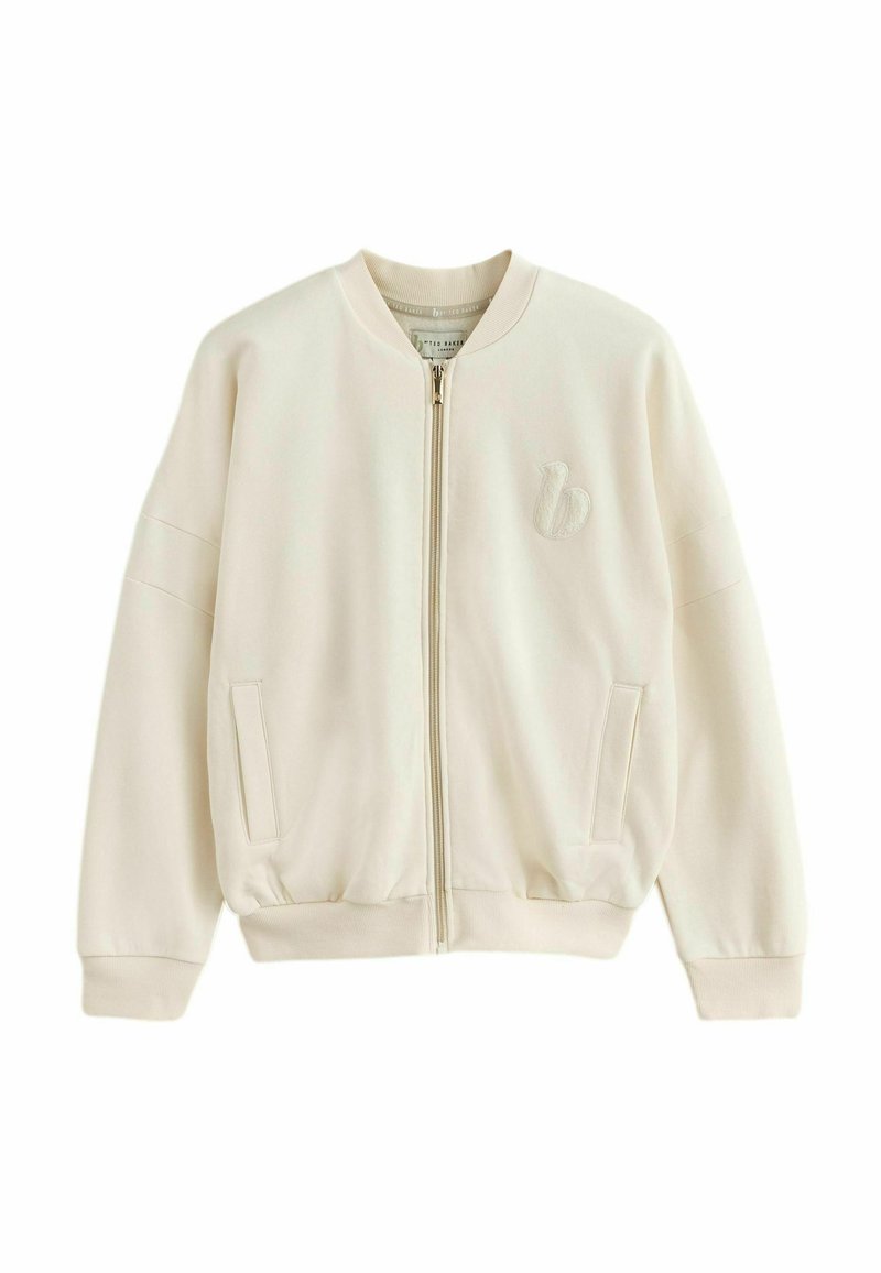 Crème beige bomberjack met ritssluiting, ribgebreide boorden en zoom, twee voorzakken en een geborduurd logo op de linkerborst.