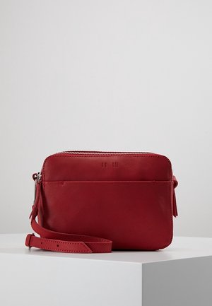 Axelremsväska - red