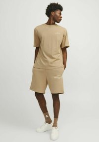 Jack & Jones PREMIUM Pantaloni sportivi - beige
