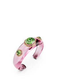 Pink translucent bangle with three green gem accents, each surrounded by small pink stones, features smooth rounded edges and a sleek design.