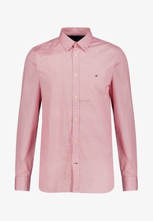 Camicia rossa con bottoni, con un piccolo motivo bianco, maniche lunghe, colletto e un logo di marca sul petto. Tessuto in cotone.