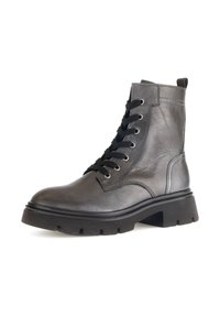 Bottine en cuir gris avec un bout arrondi, un laçage à l'avant, des œillets noirs et une semelle en caoutchouc épaisse avec de profondes rainures pour une meilleure adhérence.