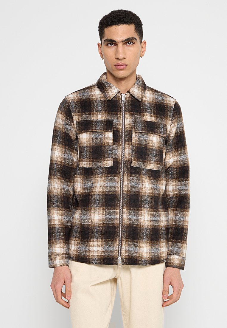 Revolution Lichte jas bruin