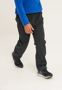 TOG24 HAINWORTH - Trousers - black