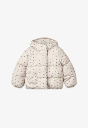 Kurtka puchowa w jasnobeżowym kolorze z pikowanym wzorem, ozdobiona małymi czarnymi kropkami, z kapturem i elastycznymi mankietami. Dwie przednie kieszenie.