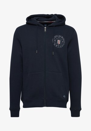 Mornarska zip-up kapuca iz mešanice bombaža, s sprednjim logotipom, dvema stranskima žepoma, kapuco na vrvico in rebrastimi manšetami ter robom.