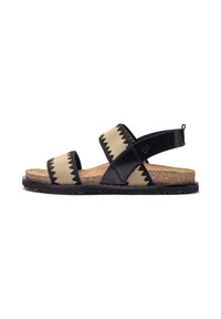 Zwarte en beige geweven sandalen met een kurken voetbed, voorzien van twee verstelbare banden en een rubberen zool, met een zigzagpatroon accent.