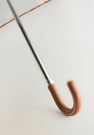 Brown leather-handled cane with a curved end, silver metallic shaft, and decorative stitching on the handle. Smooth texture and durable design.