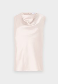 Ermeløs topp med silkelignende stoff i myk beige med drapert halsringning. Har en diskret glidelås bak og glatt, blank tekstur.