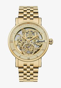 Geselecteerd, gold coloured