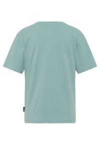 Lichtblauw t-shirt met korte mouwen, ronde hals, gemaakt van zachte katoen. Heeft een klein merklabel aan de onderzijde links.