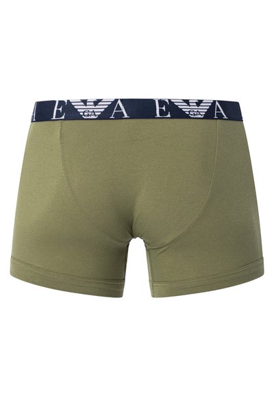 Olive green cotton boxer shorts with a navy waistband featuring white brand lettering and logo detailing. Smooth texture with stitched edges.