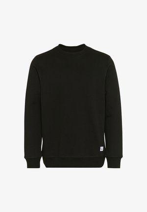Svart sweatshirt i ribbad tyg, med rund halsringning, långa ärmar och en liten etikett på den nedre sidan.