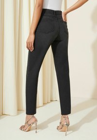 Friends Like These Traperice ravnih nogavica - washed black