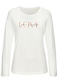 Vit långärmad t-shirt med rund halsringning och ett tryckt textdesign som säger "ÄLSKA dig själv" i rosa och svart.