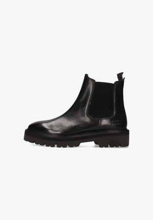 Black leather Chelsea boot with ribbed elastic sides, round toe, thick black rubber sole, and pull tab for easy wear.