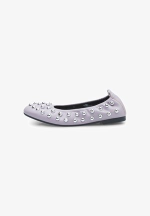 Light lavender flat shoe with rounded toe, adorned with metallic studs on the upper, smooth leather texture, and black sole.