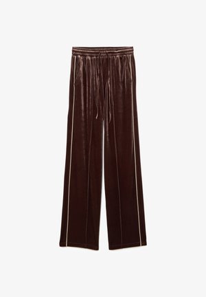 Pantaloni larghi in velluto marrone con cintura regolabile; presentano strisce laterali bianche e due tasche frontali. Texture liscia.
