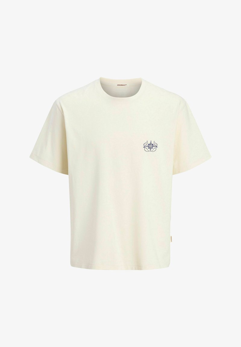 Kratkām piedurknēm t-krekls off-white kokvilnā ar apaļu dekoltē. Tam ir mazs zils emblema kreisajā krūtī. Klasiskais griezums.