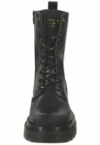 Black leather combat boots with a round toe, lace-up front, and prominent rubber sole. Features a pull tab at the heel and stitched detailing.