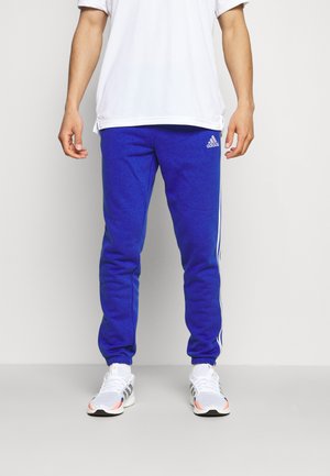 ESSENTIALS TAPERED CUFF - Spodnie treningowe - bold blue