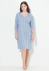 Vestito da notte blu con maniche a tre quarti, caratterizzato da un motivo a onde nere ripetuto. Tessuto morbido con scollatura a V e taglio fino al ginocchio.