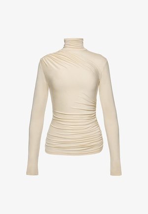Béžový rolák s dlhými rukávmi a asymetrickým riasením cez trup a ramená, priliehavý strih.