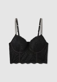 Bralette in pizzo nero con coppe imbottite, bordi scallop e spalline regolabili con dettagli metallici. Motivo floreale testurizzato su tutta la superficie.