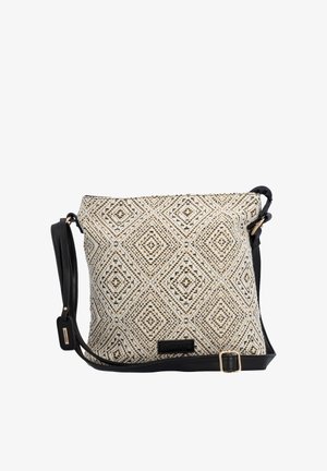 Sac bandoulière carré avec sangle noire réglable et tissu crème présentant un motif géométrique de losanges tissés en noir et or.
