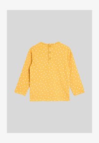 Seleccionado, yellow