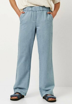 Light blue, wide-leg pants with an elastic waistband and side pockets. Made from soft fabric, featuring a smooth texture and casual fit.