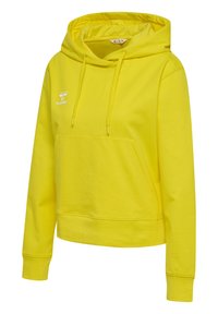 Gelbes Baumwolloverall mit Kordelzug, Kängurutasche und gerippten Bündchen. Verfügt über ein kleines weißes Logo im Brustbereich.