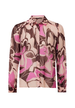 Blouse à manches longues avec col, présentant un grand motif floral rose et marron sur un tissu transparent.
