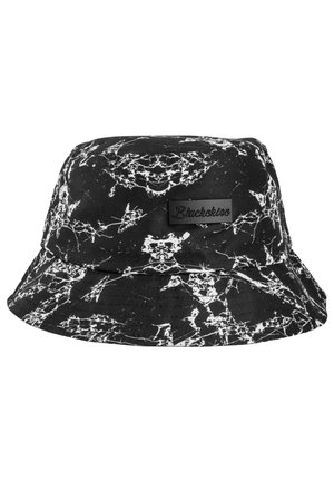 Bucket hat in black fabric featuring a white marble pattern, with a flat top and wide, downward-sloping brim. Includes a black label logo.