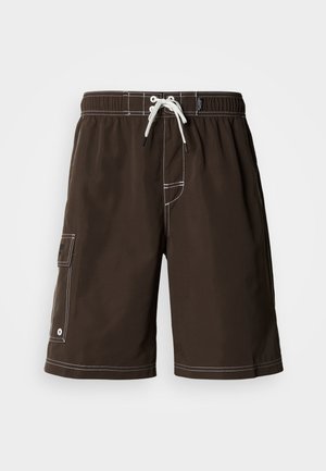 Brūnas peldbikses ar baltām šuvēm, elastīgu jostu un auklu. Tām ir sānu kravas kabata ar pogas aizdari.