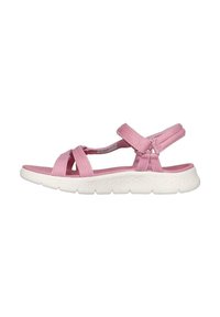 Chanclas deportivas rosas con correas de tela de acabado texturizado, banda ajustable en el tobillo y plantilla blanca acolchada.