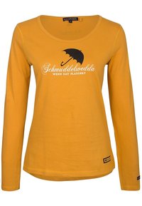 Långärmad, rundhalsad t-shirt i senapsgul bomull med svart tryck som föreställer ett paraply och texten "Schmuddelwedda när det regnar."
